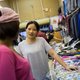 Maliya Lu helps a customer look for fabric at her store in China City Wholesale centre in Doornfontein, Johannesburg. Lu specialises in importing suits and other fabrics from China and Africa. She has had the store for 14 years and says "we are OK at the moment, the economy is not too bad for us". China City is a development near the CBD in Johannesburg and has clientele from all across the greater city.